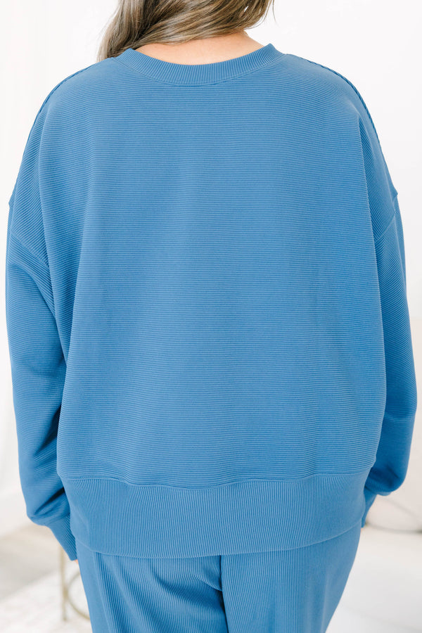 Plus Size slate blue ribbed loungewear set with a long sleeve crewneck top and wide-leg pants.