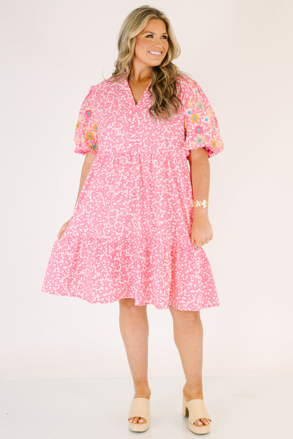 Chic Soul plus size clothing, pink knee length dress with bubble sleeves that have a multi color floral pattern throughout as well as a floral pattern throughout the dress and a slight v-neckline