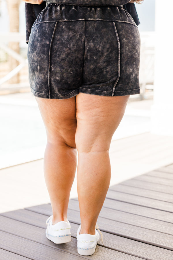Plus Size black acid wash shorts with an elastic drawstring waistband and soft fabric.