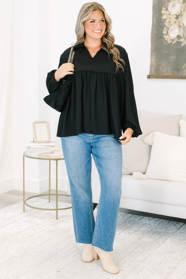 Plus size black Enchanting Days Top with a flowy fit, ribbed texture, and long balloon sleeves.
