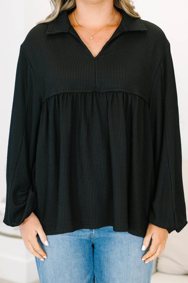 Plus size black Enchanting Days Top with a flowy fit, ribbed texture, and long balloon sleeves.
