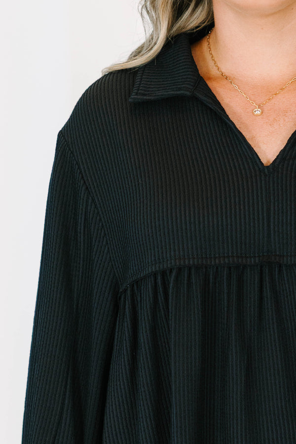 Plus size black Enchanting Days Top with a flowy fit, ribbed texture, and long balloon sleeves.