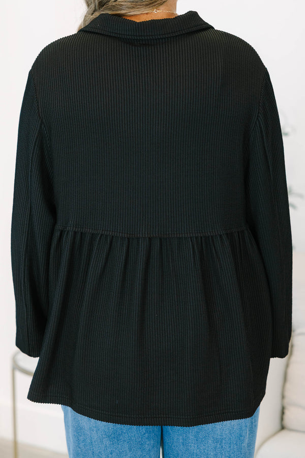 Plus size black Enchanting Days Top with a flowy fit, ribbed texture, and long balloon sleeves.