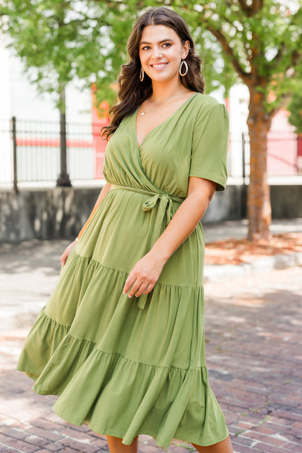Chic Soul plus size clothing, green short sleeve midi dress with tiered detail and cross detail along chest with synch waist with belt
 