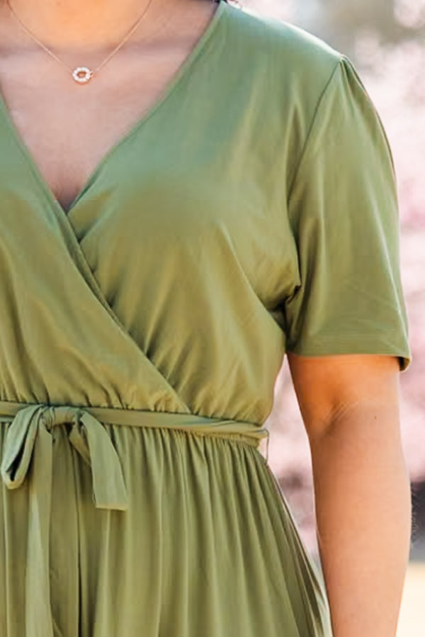Chic Soul plus size clothing, green short sleeve midi dress with tiered detail and cross detail along chest with synch waist with belt
 