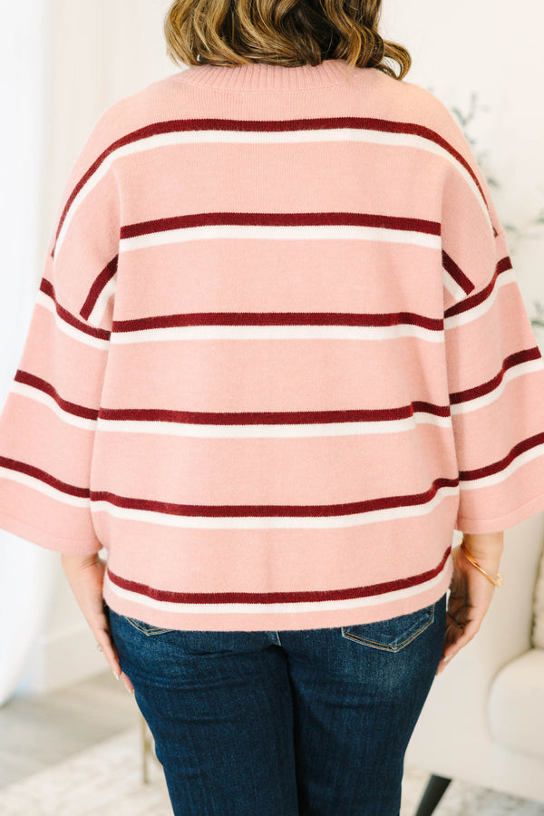Plus size pink striped cardigan with a relaxed fit, button-down front, and soft knit fabric.