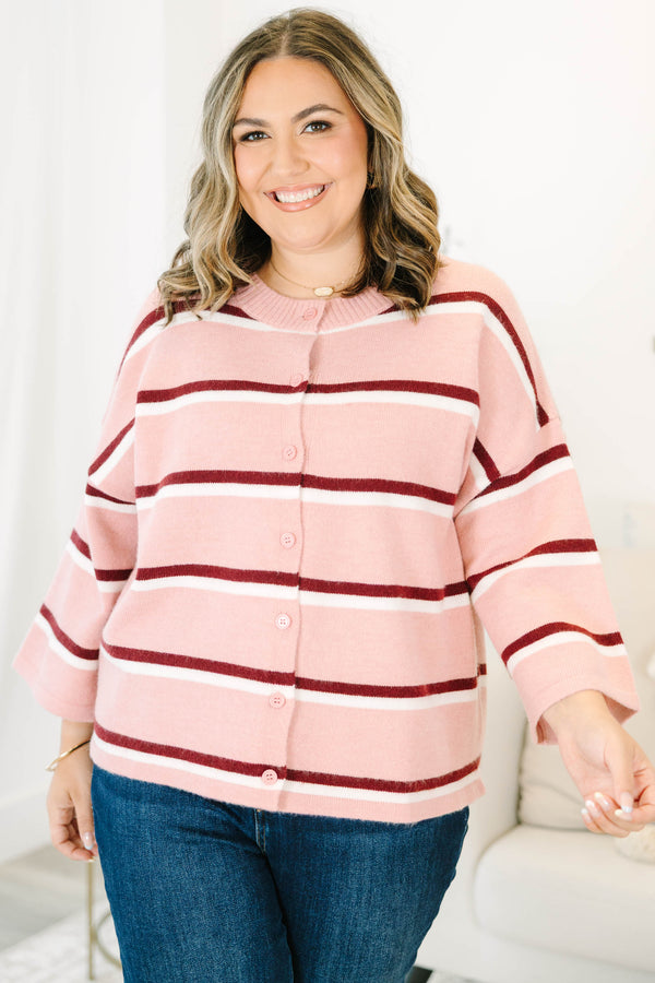 Plus size pink striped cardigan with a relaxed fit, button-down front, and soft knit fabric.