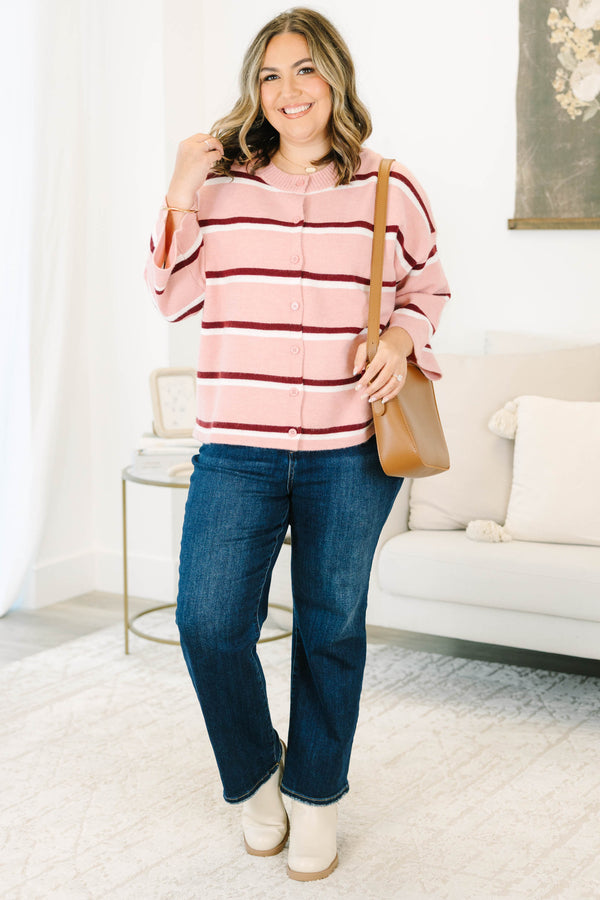 Plus size pink striped cardigan with a relaxed fit, button-down front, and soft knit fabric.