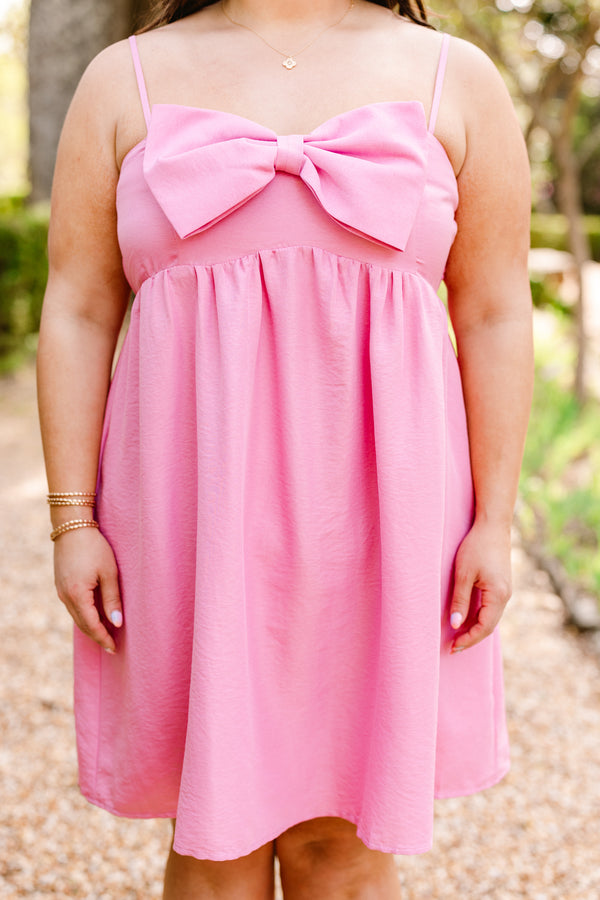 Chic Soul plus size clothing, sleeveless spaghetti strap baby pink flowy baby doll dress with a big pink bow on the front with a square-neckline