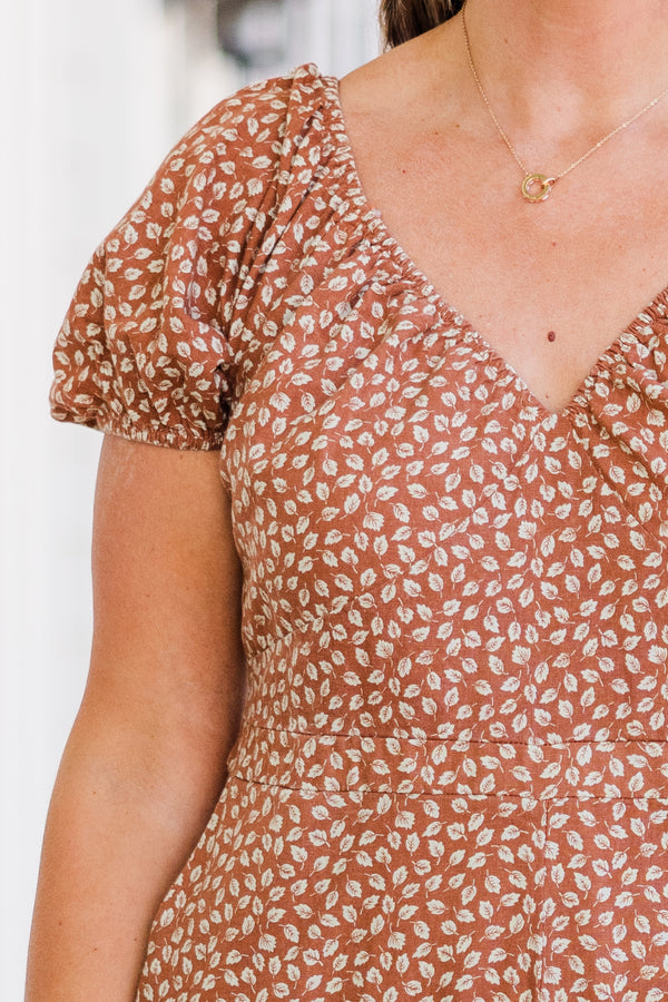 Chic Soul plus size clothing, short-sleeve brick mix jumpsuit with smocked v-neckline and puffed sleeves with small white floral leaf pattern 