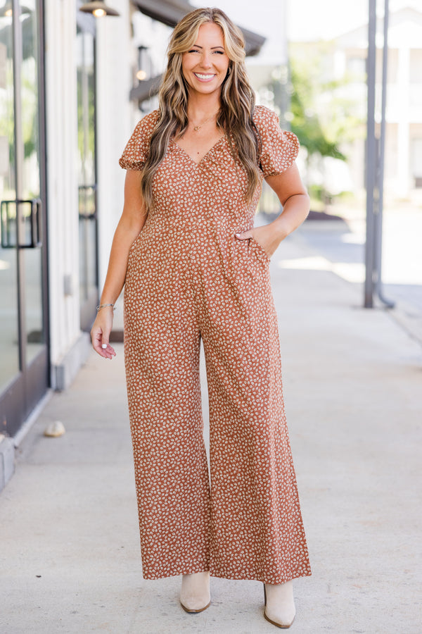Chic Soul plus size clothing, short-sleeve brick mix jumpsuit with smocked v-neckline and puffed sleeves with small white floral leaf pattern 