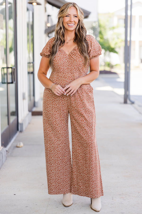 Chic Soul plus size clothing, short-sleeve brick mix jumpsuit with smocked v-neckline and puffed sleeves with small white floral leaf pattern 