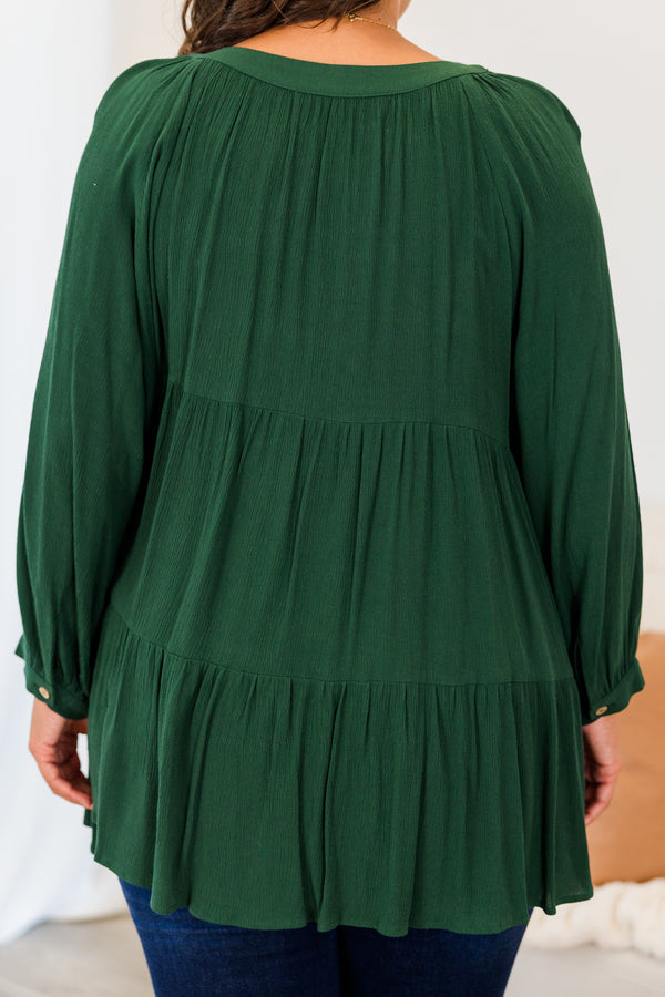 Chic Soul plus size clothing, forest green long sleeve button up top with round neckline with cuff sleeves and ruffle tiered detailing with button detail on sleeve