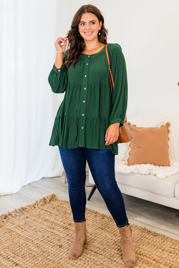 Chic Soul plus size clothing, forest green long sleeve button up top with round neckline with cuff sleeves and ruffle tiered detailing with button detail on sleeve