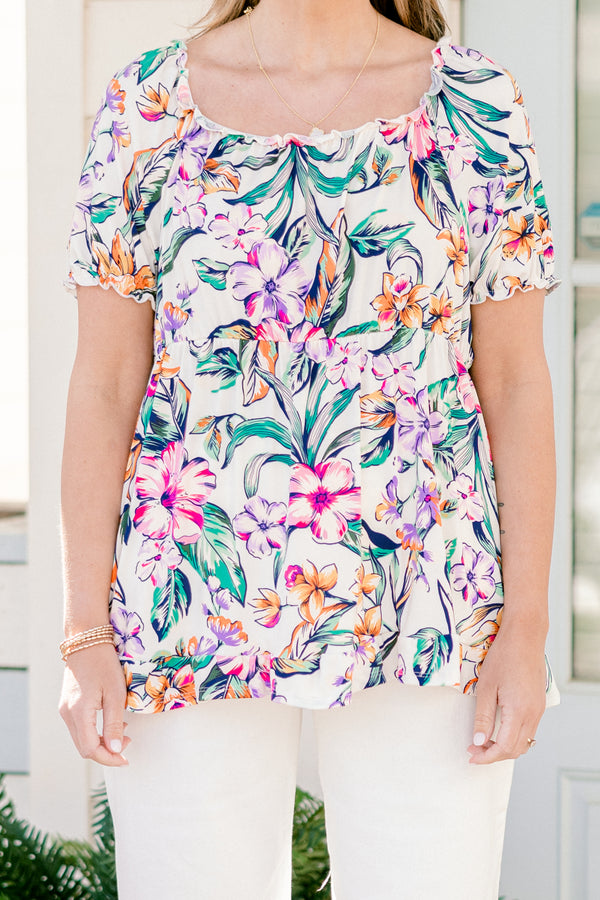 Chic Soul plus size clothing, short-puffed-sleeve ivory top with a multi-colored floral pattern and subtle ruffled detailing on sleeves