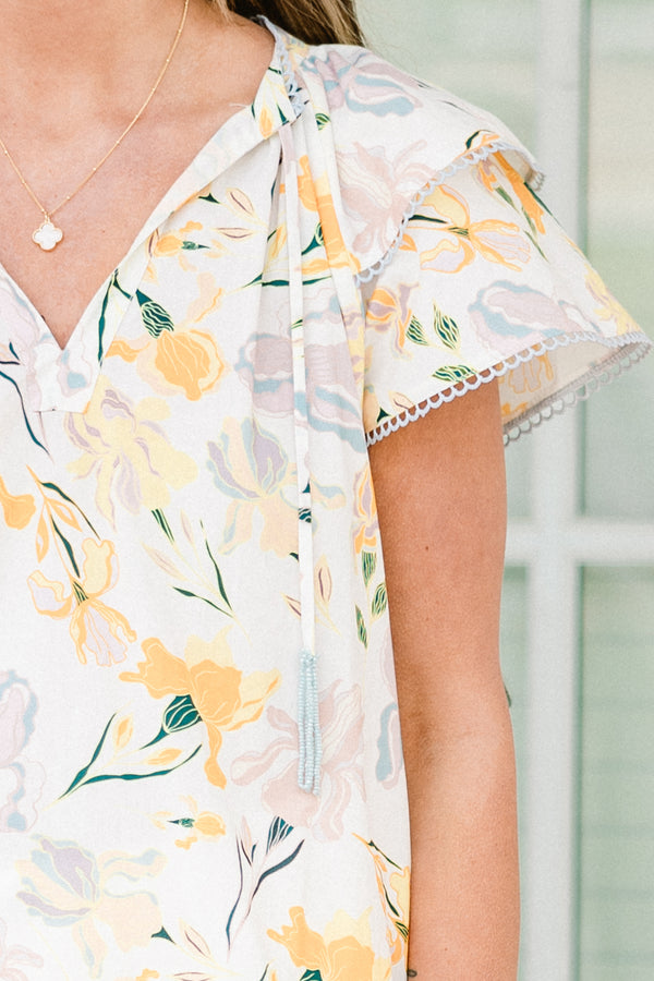 Chic Soul plus size clothing, short-flutter-sleeve yellow top with a split-v-neckline and a yellow floral pattern