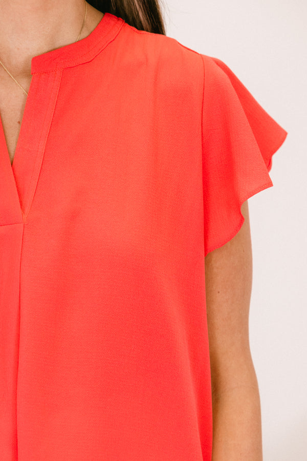 Chic Soul plus size clothing, coral short sleeve flowy top with v cutout along neckline with flutter sleeves

