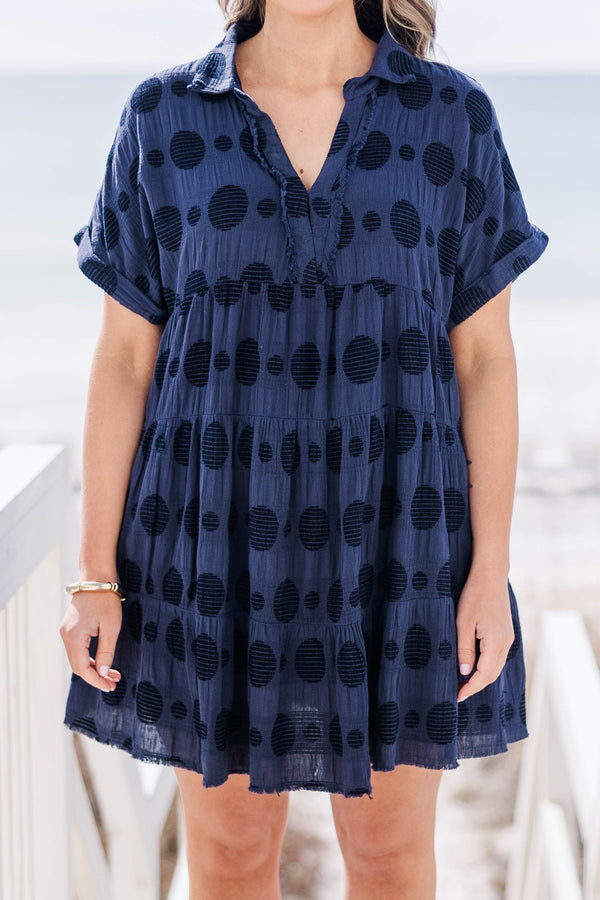 Chic Soul plus size clothing, navy short sleeve mini dress with tiers and v neck with black circle patter and cuff sleeves