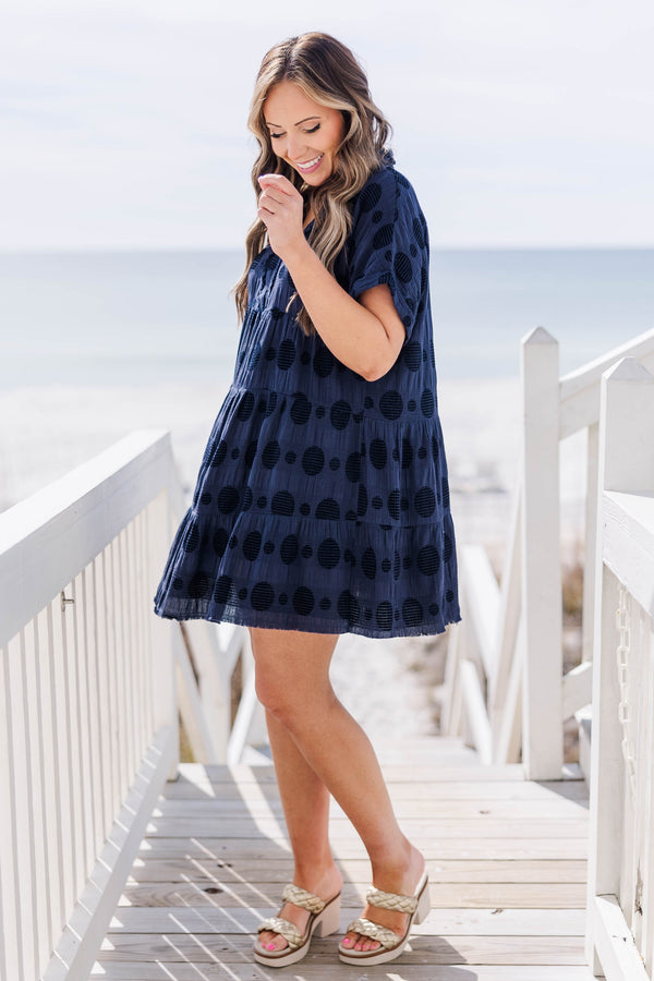 Chic Soul plus size clothing, navy short sleeve mini dress with tiers and v neck with black circle patter and cuff sleeves