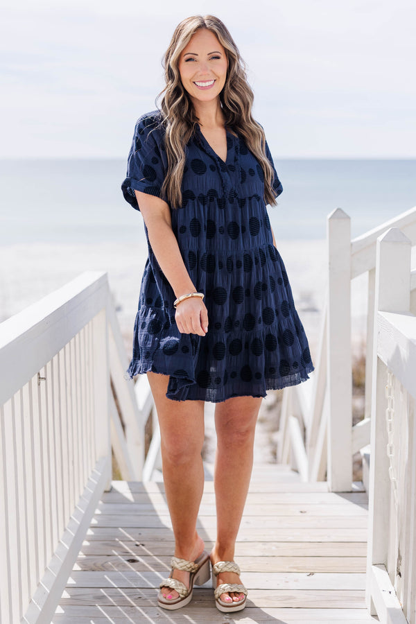 Chic Soul plus size clothing, navy short sleeve mini dress with tiers and v neck with black circle patter and cuff sleeves
