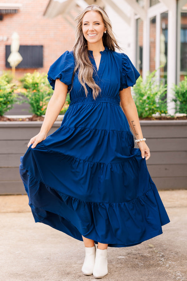 Chic Soul plus size clothing, navy colored midi length dress with puffy short sleeves and sinches at the waist and 4 ruffle details