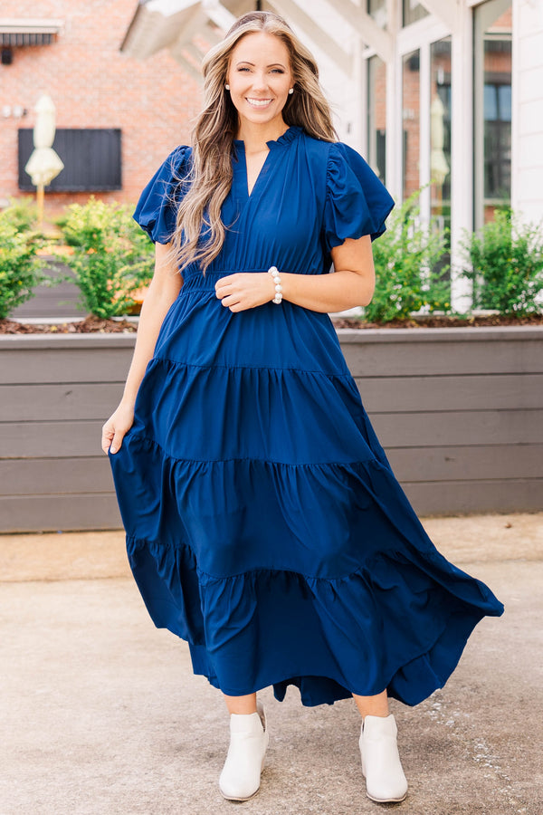 Chic Soul plus size clothing, navy colored midi length dress with puffy short sleeves and sinches at the waist and 4 ruffle details