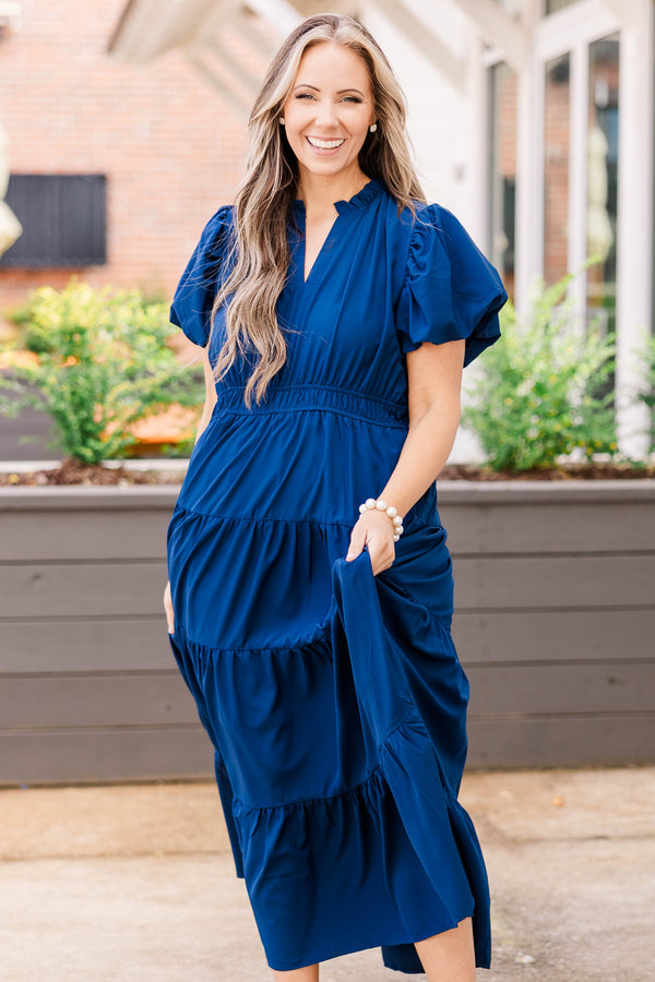 Chic Soul plus size clothing, navy colored midi length dress with puffy short sleeves and sinches at the waist and 4 ruffle details