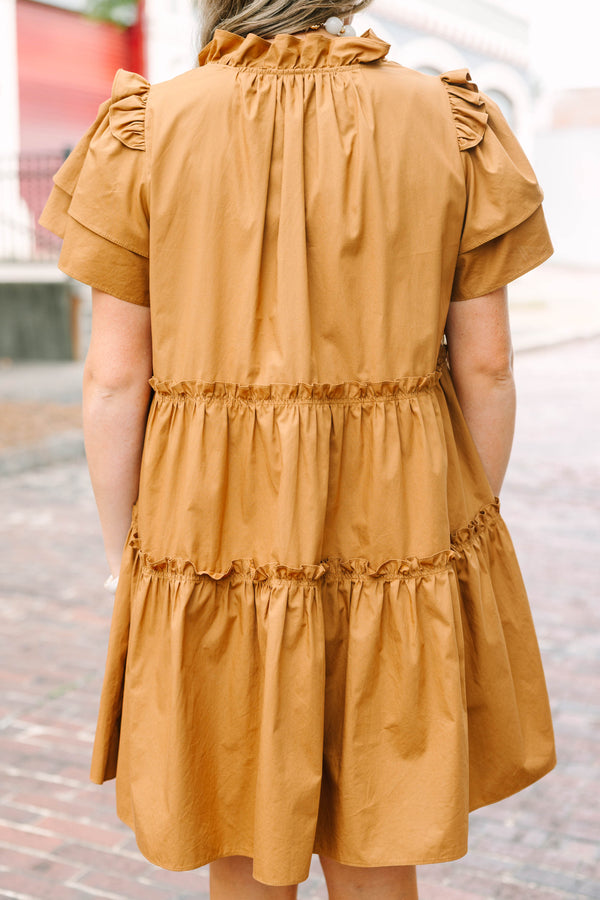 Plus Size tiered brown babydoll dress with flutter sleeves, a ruffled neckline, and tie details.