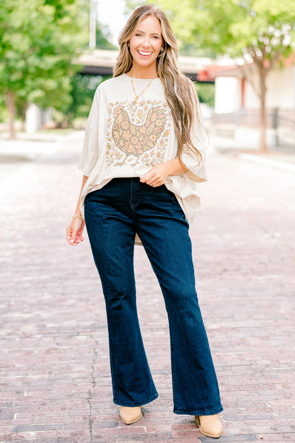 Chic Soul plus size clothing, dust colored short sleeve boyfriend tee with a turkey graphic on the center of the tee that is filled with a fall leaves pattern and also has leaves around the turkey 