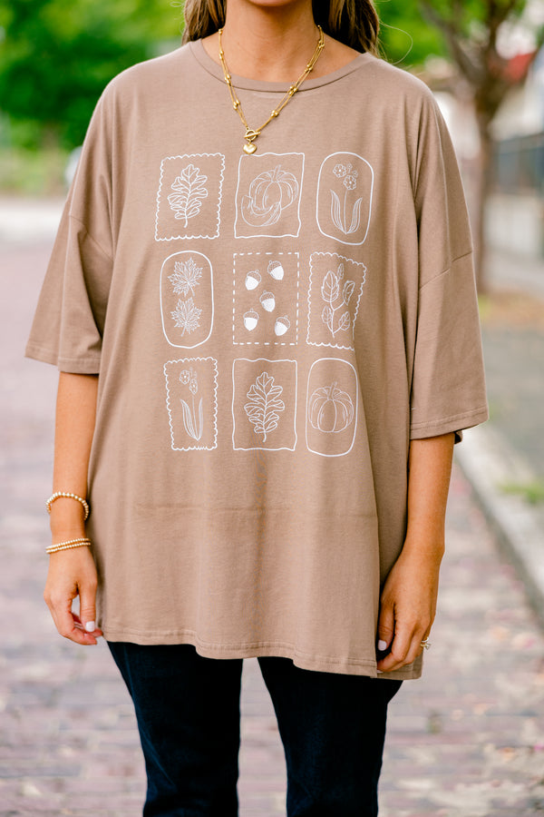 Chic Sou plus size clothing, brown short sleeve graphic tee with a fall floral line design on the center of the shirt 