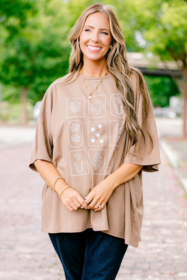 Chic Sou plus size clothing, brown short sleeve graphic tee with a fall floral line design on the center of the shirt 