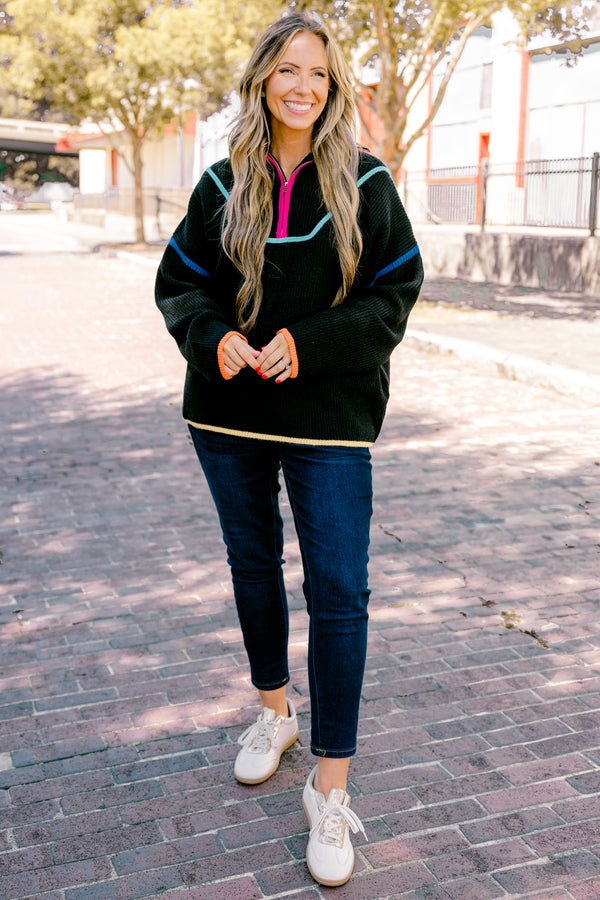 Plus Size black knit quarter-zip sweater with vibrant multi-colored piping and orange cuffs.