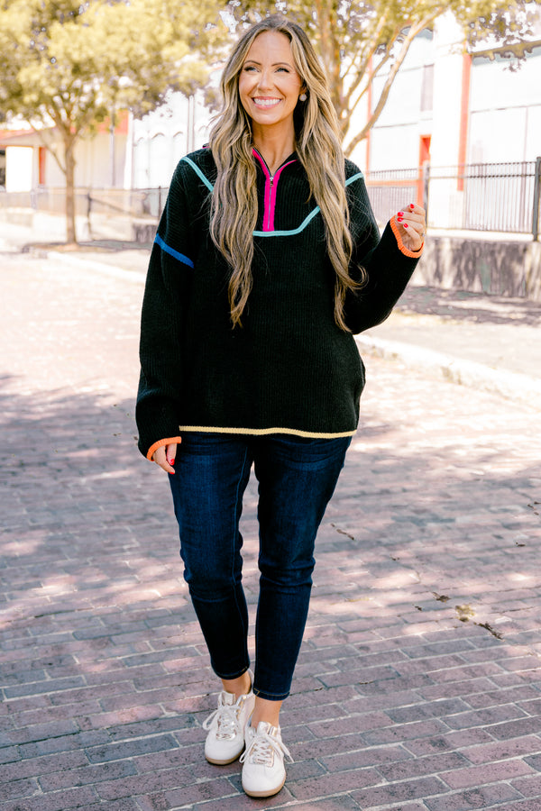 Plus Size black knit quarter-zip sweater with vibrant multi-colored piping and orange cuffs.