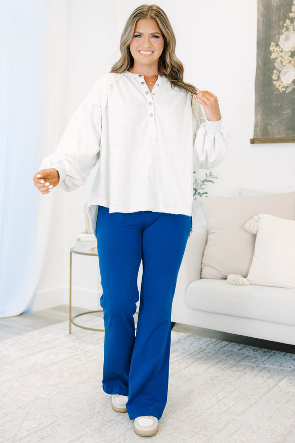 Plus Size light navy flare leggings with a high-waisted fit in a soft cotton-spandex blend.