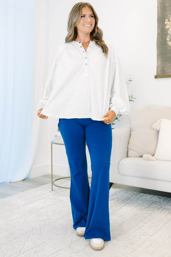 Plus Size light navy flare leggings with a high-waisted fit in a soft cotton-spandex blend.