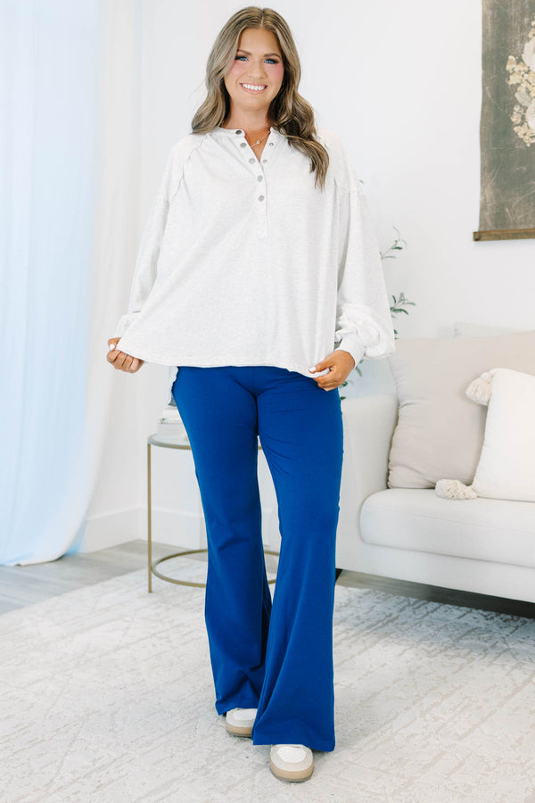 Plus Size light navy flare leggings with a high-waisted fit in a soft cotton-spandex blend.