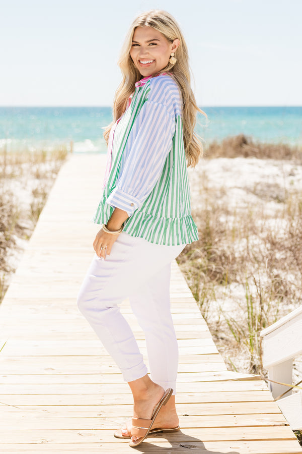 Chic Soul plus size clothing, multi colored stripe design button up top with collar detail with blue on sleeve, orange on sleeve, and pink and green split in the middle