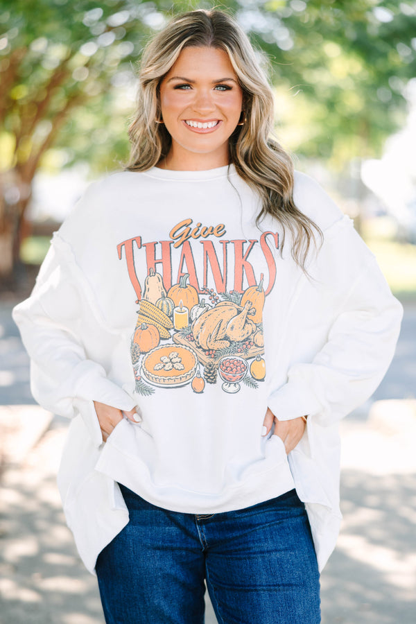 Plus Size ivory oversized crewneck sweatshirt with a vintage Give Thanks graphic and raw-edge seams.