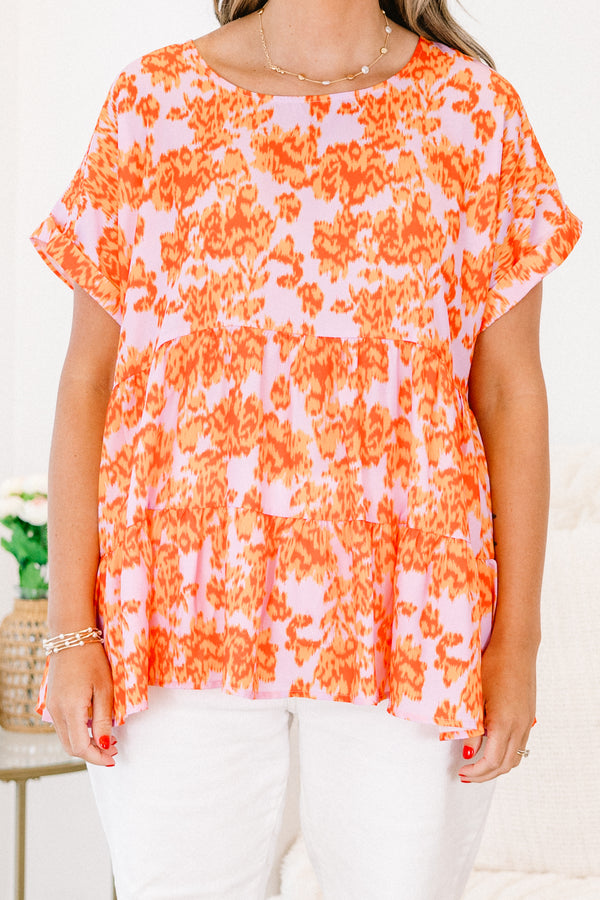 Chic Soul plus size clothing, orange short sleeve babydoll top with a light pink abstract pattern 
