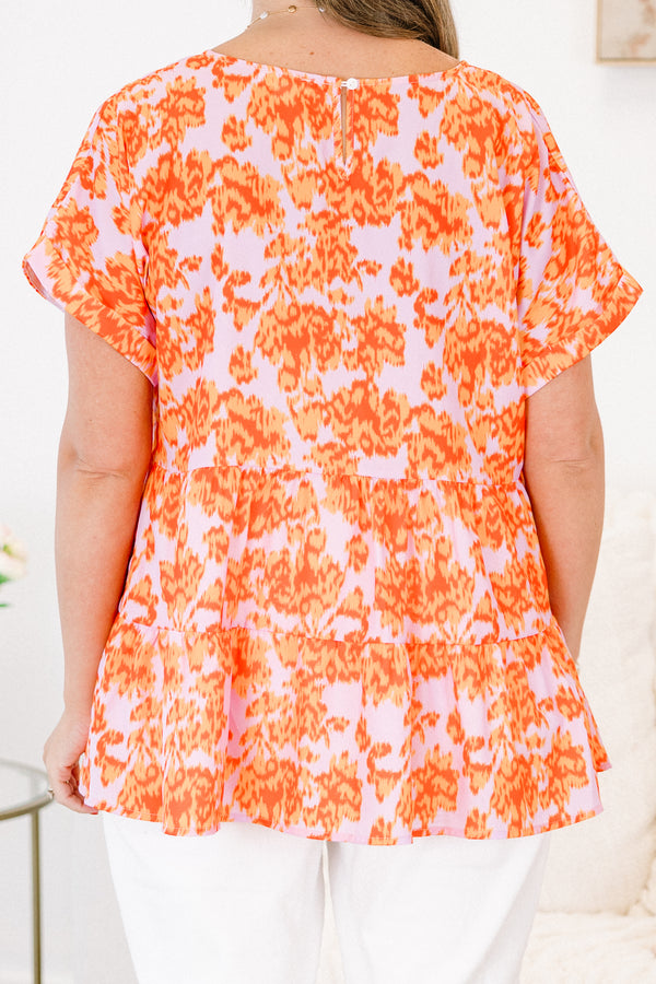 Chic Soul plus size clothing, orange short sleeve babydoll top with a light pink abstract pattern 
