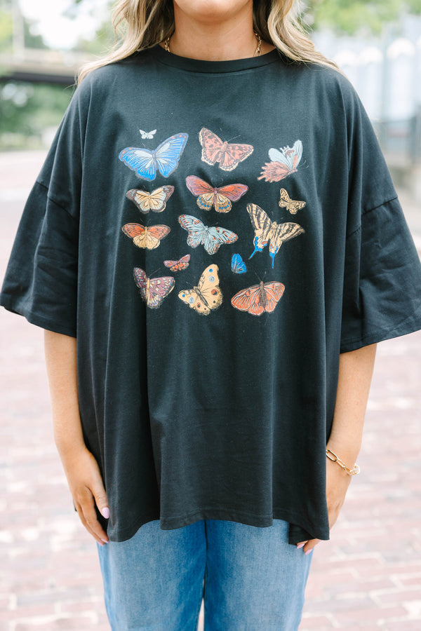 Chic Soul plus size clothing, black oversized boyfriend tee with an assortment of butterflies