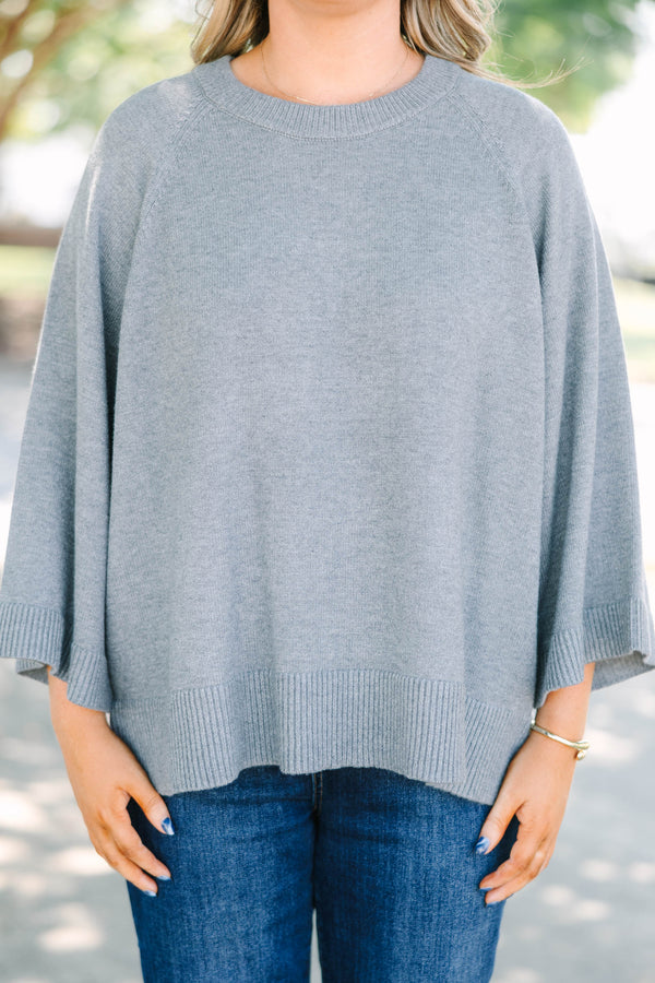 Plus Size gray crewneck sweater with wide three-quarter length sleeves and a ribbed hem.
