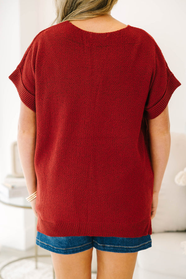Plus size Cabernet red short sleeve knit sweater with a relaxed fit and ribbed hem.