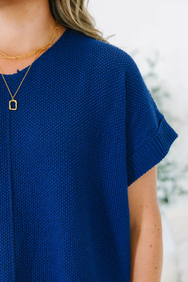 Plus size light navy short sleeve sweater with a flowy fit and textured knit fabric.
