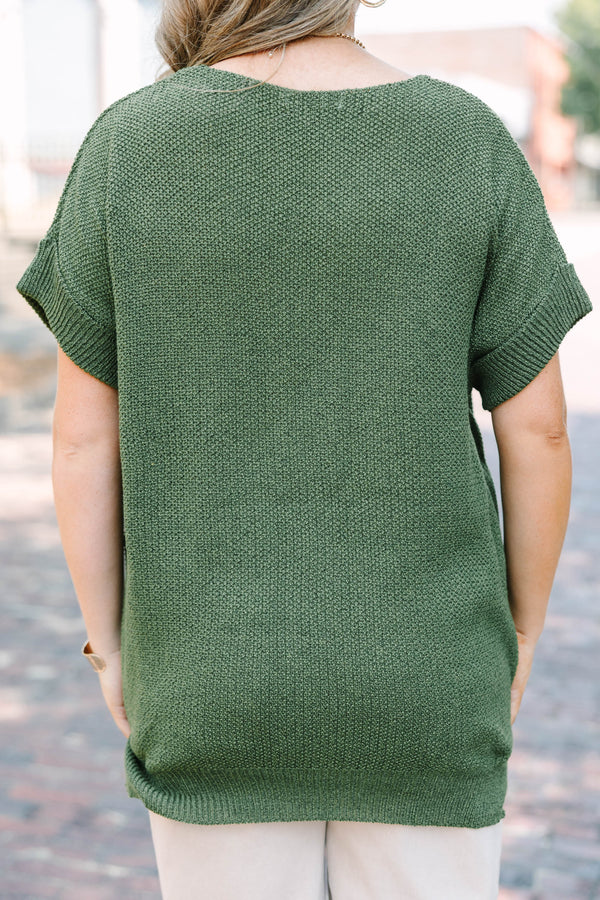 Plus Size light olive short sleeve knit sweater with a round neckline and relaxed fit.