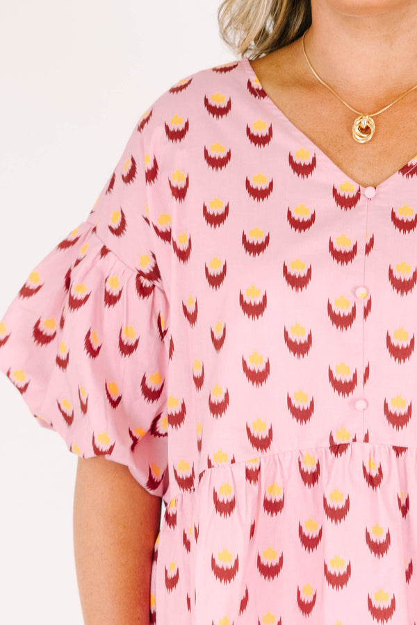 Chic Soul plus size clothing, pink short sleeve baby doll blouse with button up detail down the front with v neckline with bubble sleeves with abstract yellow/fuchsia print