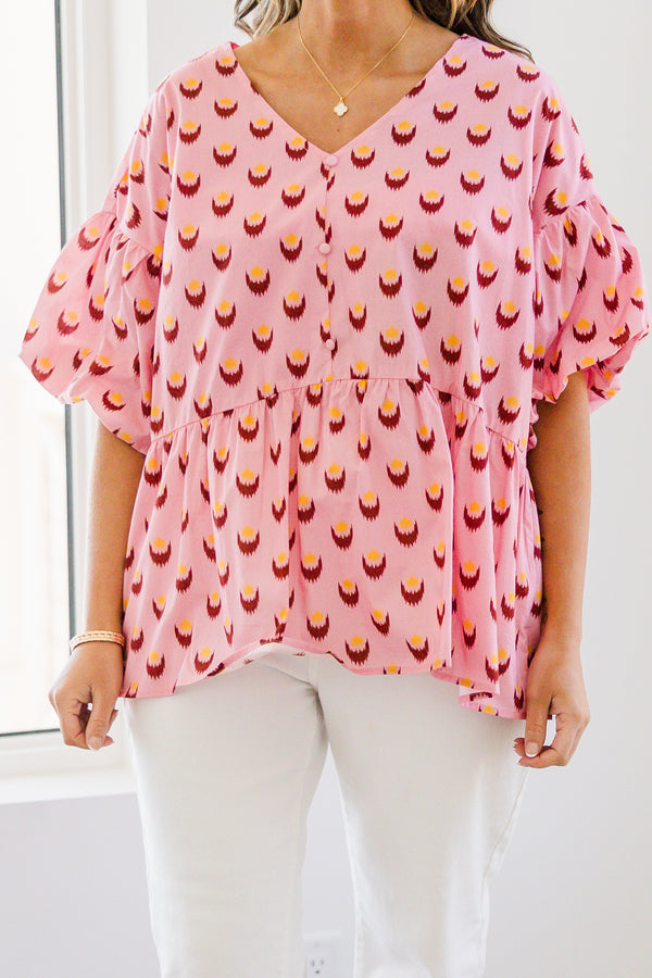 Chic Soul plus size clothing, pink short sleeve baby doll blouse with button up detail down the front with v neckline with bubble sleeves with abstract yellow/fuchsia print