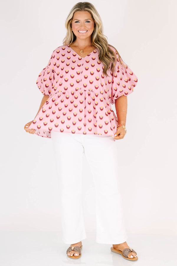 Chic Soul plus size clothing, pink short sleeve baby doll blouse with button up detail down the front with v neckline with bubble sleeves with abstract yellow/fuchsia print