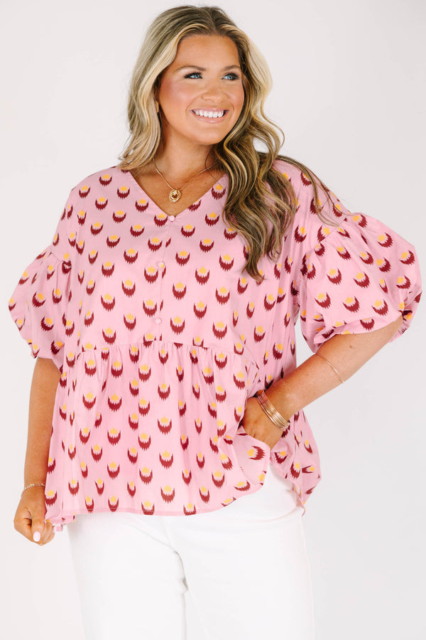 Chic Soul plus size clothing, pink short sleeve baby doll blouse with button up detail down the front with v neckline with bubble sleeves with abstract yellow/fuchsia print