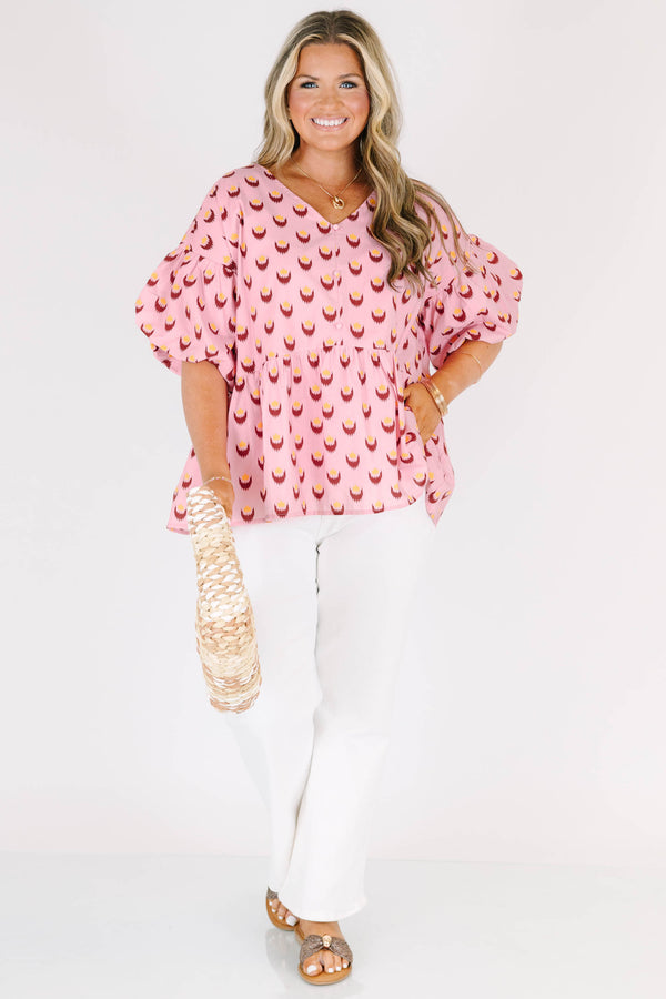 Chic Soul plus size clothing, pink short sleeve baby doll blouse with button up detail down the front with v neckline with bubble sleeves with abstract yellow/fuchsia print